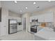 Updated kitchen featuring stainless steel appliances and white cabinetry at 10015 Lattice Ct, Charlotte, NC 28269