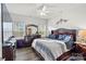 Spacious bedroom with large windows and wood-like flooring at 10356 Black Locust Ln, Harrisburg, NC 28215