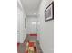 Bright entryway with hardwood floors and red accent rug at 10356 Black Locust Ln, Harrisburg, NC 28215