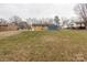 Large backyard with green grass and a view of the home's exterior at 1221 S Myrtle School Rd, Gastonia, NC 28052