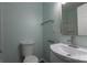 Well-lit bathroom with a modern sink, faucet, and fixtures and tile surround in the shower at 1221 S Myrtle School Rd, Gastonia, NC 28052