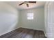 Cozy bedroom featuring new floors, neutral paint, closet, and a bright window at 1221 S Myrtle School Rd, Gastonia, NC 28052