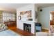 White brick fireplace as a focal point in the living area at 1223 India Hook Rd, Rock Hill, SC 29732