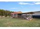 Wooden chicken coop with attached shed at 130 Portman Ln, Statesville, NC 28625