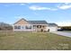 Charming ranch home with gray and beige siding, and a two-car garage at 130 Portman Ln, Statesville, NC 28625