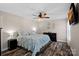 Main bedroom with king-size bed, dresser, and ceiling fan at 130 Portman Ln, Statesville, NC 28625