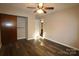 Spacious bedroom with large closet and wood-look flooring at 1419 Riverwood Ct, Rock Hill, SC 29732