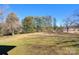 Large backyard with mature trees and open space at 1491 Black Hwy, York, SC 29745