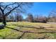 Spacious backyard with large trees and grassy area at 1491 Black Hwy, York, SC 29745