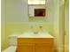 Simple bathroom with light yellow tile and a vanity at 1491 Black Hwy, York, SC 29745