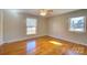 Bright bedroom with hardwood floors and ceiling fan at 1491 Black Hwy, York, SC 29745