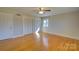 Large bedroom with hardwood floors and double closets at 1491 Black Hwy, York, SC 29745