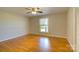 Bright bedroom with hardwood floors and ceiling fan at 1491 Black Hwy, York, SC 29745