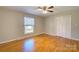 Hardwood floor bedroom with ceiling fan and closet at 1491 Black Hwy, York, SC 29745