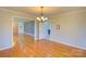 Bright dining room with hardwood floors and view to living room at 1491 Black Hwy, York, SC 29745