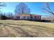 Brick ranch house with large yard and mature trees at 1491 Black Hwy, York, SC 29745