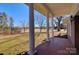 Brick front porch with columns overlooks yard at 1491 Black Hwy, York, SC 29745