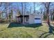 Detached one-car garage with covered parking area on a grassy lot at 1491 Black Hwy, York, SC 29745
