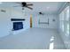 Living room with hardwood floors, fireplace and ceiling fans at 1491 Black Hwy, York, SC 29745