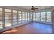 Bright sunroom with terracotta tile floor and ceiling fan at 1491 Black Hwy, York, SC 29745