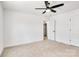 Bright bedroom with ceiling fan and double doors to closet at 1510 Nectar Way, Kannapolis, NC 28027