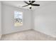 Bright bedroom with ceiling fan and view at 1510 Nectar Way, Kannapolis, NC 28027