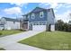 Two-story house with stone and siding at 1510 Nectar Way, Kannapolis, NC 28027