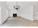 Living room with hardwood floors, fireplace, and chandelier at 1510 Nectar Way, Kannapolis, NC 28027