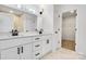 Modern bathroom with double vanity, walk-in closet, and elegant tile at 1520 Nectar Way, Kannapolis, NC 28027