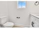 Simple bathroom with white vanity and modern fixtures at 1520 Nectar Way, Kannapolis, NC 28027