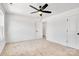 Spacious bedroom with ceiling fan and neutral carpeting at 1520 Nectar Way, Kannapolis, NC 28027