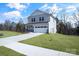 Two-story house with a two-car garage and manicured lawn at 1520 Nectar Way, Kannapolis, NC 28027