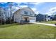 Two-story house with a two-car garage and manicured lawn at 1520 Nectar Way, Kannapolis, NC 28027