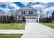 Two-story house with a two-car garage and manicured lawn at 1520 Nectar Way, Kannapolis, NC 28027