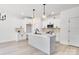 Modern kitchen with white cabinets, quartz countertops and island at 1520 Nectar Way, Kannapolis, NC 28027