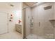 Modern bathroom with a large walk-in shower and vanity at 15209 Red Canoe Way, Charlotte, NC 28278