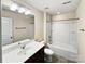 Bathroom with single vanity, mirror, and bathtub at 15305 Colonial Park Dr, Huntersville, NC 28078