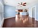 Open dining area adjacent to the kitchen with hardwood floors at 15305 Colonial Park Dr, Huntersville, NC 28078