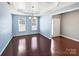 Dining room with hardwood floors and light blue walls at 15305 Colonial Park Dr, Huntersville, NC 28078