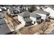 Aerial view of a two-story house with gray roof and green siding at 15305 Colonial Park Dr, Huntersville, NC 28078