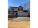 Two-story house with two-car garage and neutral colors at 1604 Lincoln Dr, Shelby, NC 28152