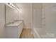 Double vanity bathroom with a shower/tub combo at 162 Four Andrews Dr, Harmony, NC 28634