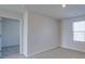 Bright bedroom with window and neutral walls at 162 Four Andrews Dr, Harmony, NC 28634