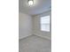 Bright bedroom with gray carpet, a window, and neutral walls at 162 Four Andrews Dr, Harmony, NC 28634