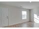 Empty spare bedroom with hardwood floors and a window at 162 Four Andrews Dr, Harmony, NC 28634