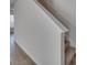 Carpeted staircase with white railing and hardwood floors at 162 Four Andrews Dr, Harmony, NC 28634