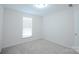 Bright bedroom with carpeted floors at 1819 Teachers House Nw Rd, Concord, NC 28027