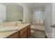 Bathroom features a shower/tub combo and wood vanity at 182 Grand View Dr, New London, NC 28127