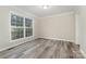 Spacious bedroom with large window and vinyl flooring at 182 Grand View Dr, New London, NC 28127