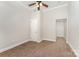 Carpeted bedroom with ceiling fan and closet at 182 Grand View Dr, New London, NC 28127